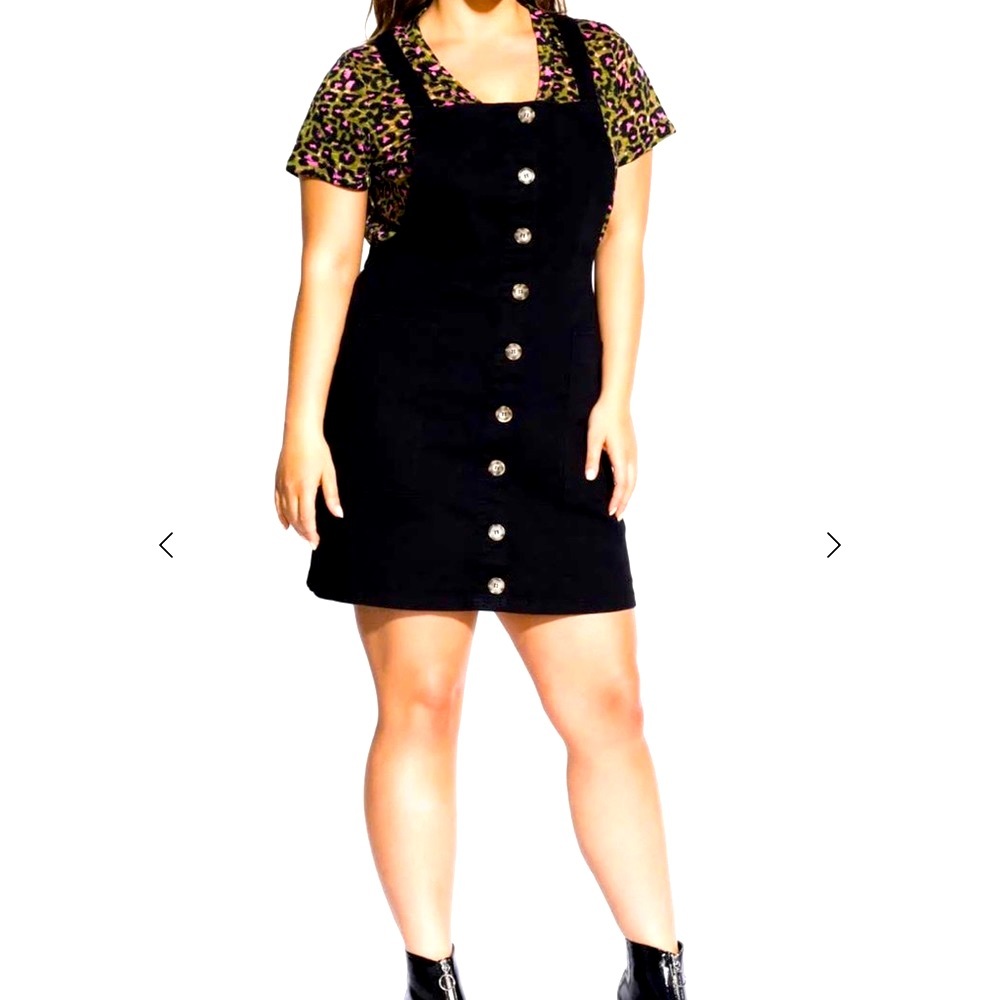 Black cotton dress with tortoiseshell print buttons and pockets. Size 18.